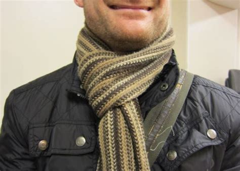 Fold the scarf in half lengthwise and wrap it around your neck; How to tie a men's scarf - Top 7