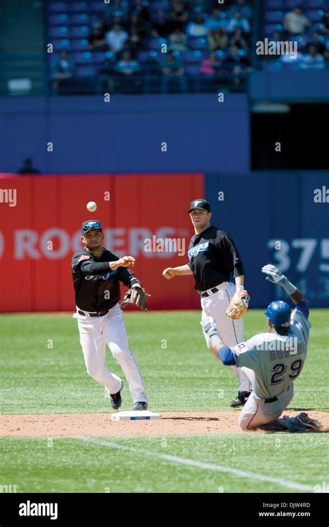 Toronto Blue Jays Alex Gonzalez 11 Throws To First Base As Part Of A Double Play In The Fifth