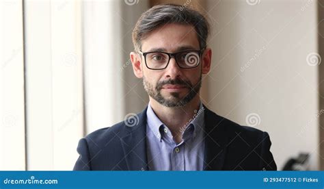 Handsome Positive Middle Aged Businessman Staring At Camera Stock