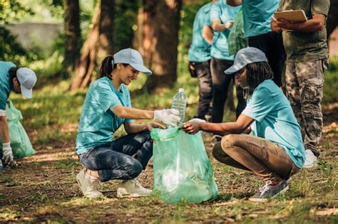 People Cleaning The Environment Stock Photo Download Image Now Istock