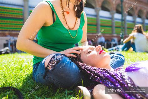 Woman Giving Friend Head Massage On Grass Milan Italy — Buildings