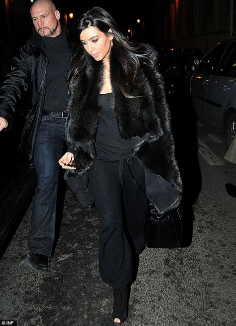Pregnant Kim Kardashian Pairs Her Chic Fur Coat With Jogging Bottoms