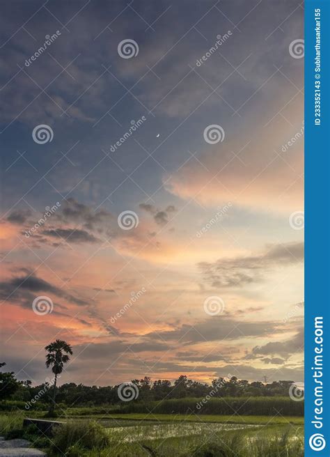 A Beautiful Sunset Afternoon Landscape With Bright Orange Clouds Stock