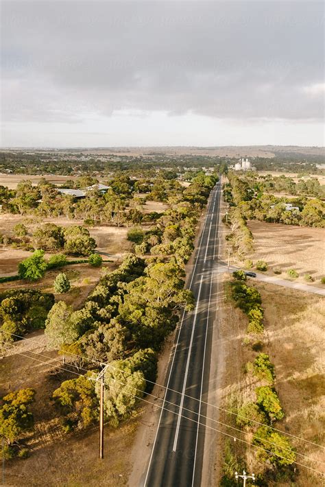 Aerial View Of Road Through Dry Countryside In Rural Australia By