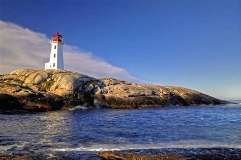 Lighthouse At Peggys Cove Photograph By Donna Caplinger Fine Art America