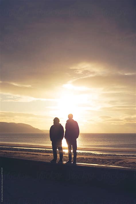 Father And Son At Sunset By Stocksy Contributor Catherine Macbride Stocksy