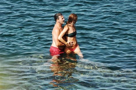 Jon Hamm And Anna Osceola Show PDA While Swimming In Italy