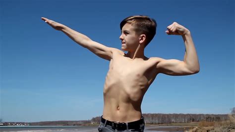 Amazing Kid Bodybuilder Flexing At Lake And Showing His Progress