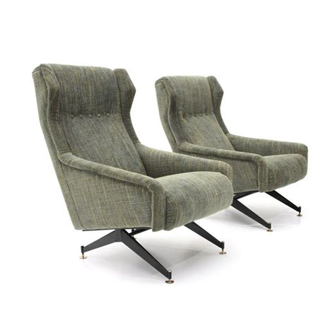 Fancy chilling like this lizard on a gorgeously. Pair of Italian mid-century armchairs with green fabric ...