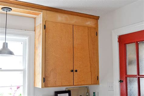 Once dry, replace the hardware and rehang the door. DIY Inexpensive Cabinet Updates | Beautiful Matters