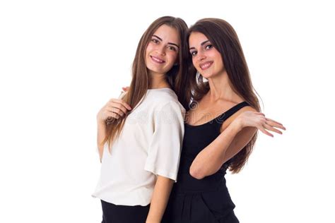 Two Young Woman Embracing Stock Photo Image Of Looking 79546870