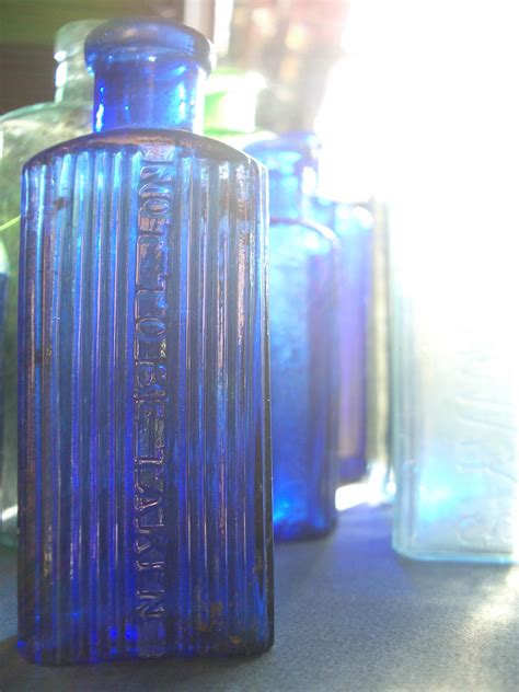 Blue Antique Medicine Bottle With Strong Light