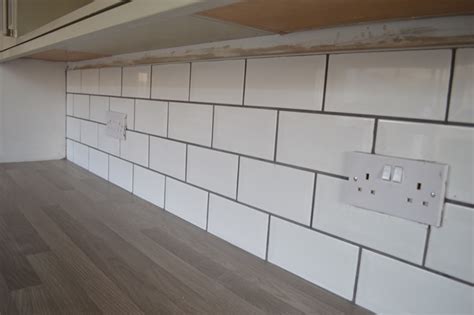 Brass task lighting illuminates the work area. DIY Kitchen Tiles, Knives & Embarrassing Headwear - WELL I ...