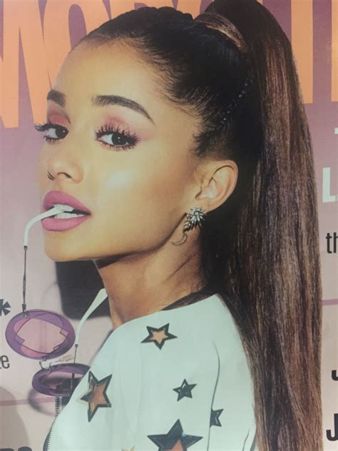 A Magazine Cover With An Image Of A Woman Wearing Pink Lipstick And