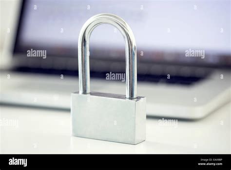Padlock In Front Of Laptop Computer Representing Internet Security