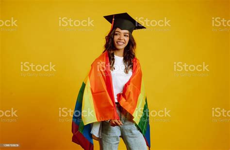 Young Curly Hair Woman Stand With Lgbt Pride Flag Stock Photo