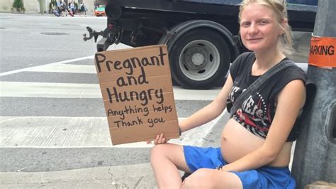 Homeless Woman With Sign