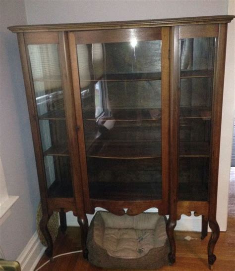 Fashioned from glass and hardwoods, these curio cabinets are ideal for displaying heirlooms, fine china, glassware and other collectibles. Large Antique Curio Cabinet! 6 Legs Beautiful Wood Curved ...