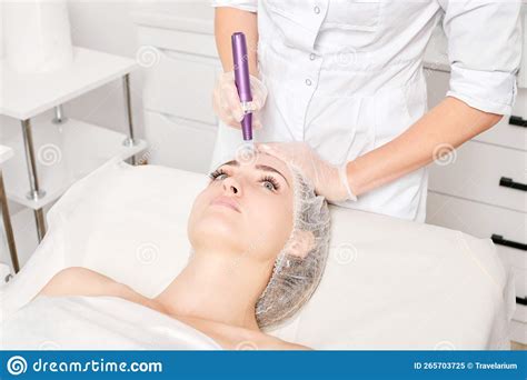 Cosmetologist Makes Mesotherapy Injection For Rejuvenation Woman Face Procedure In Beauty Salon