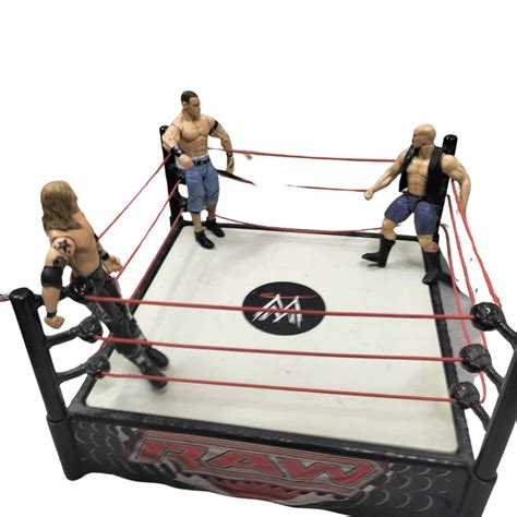 Wwe Wrestling Ring And 3 Wrestlers S