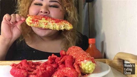 Woman Satisfies Her Mexican Munchies With Hot Cheetos Valentina Salsa Picante And Corn Video