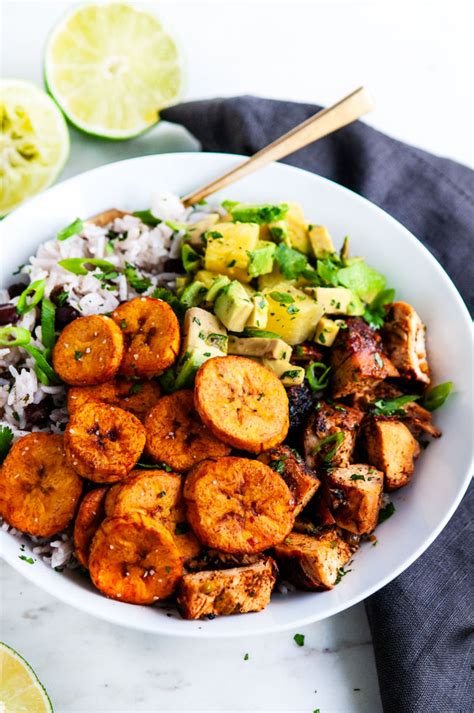 Juicy roast chicken thighs are paired with our take on moros y cristianos, the cuban version of rice and beans, in this easy dinner recipe. Cuban Chicken Bowls with Fried Plantains - Aberdeen's Kitchen