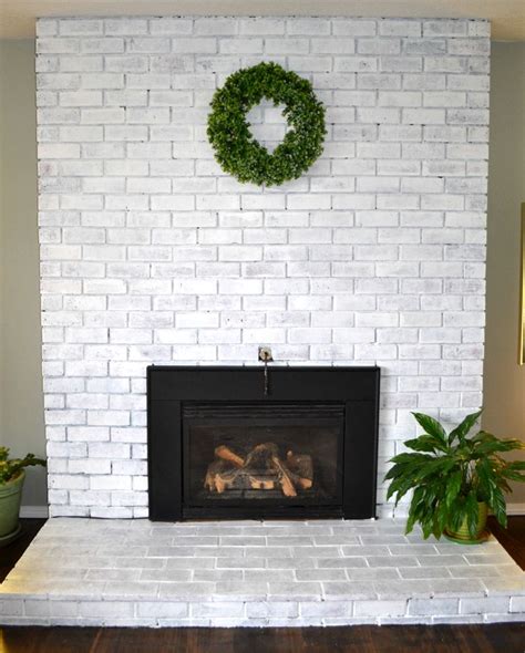 An Easy Diy How To Whitewash A Brick Fireplace White Wash Brick