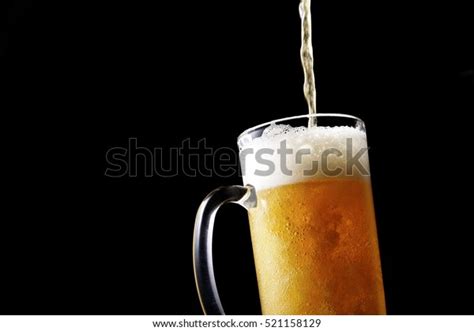 Pouring Beer Into Glass Stock Photo Edit Now 521158129