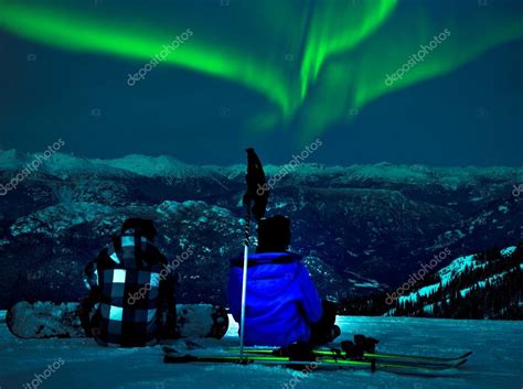 Northern Lights Over Snow Mountain Peak — Stock Photo © Surangastock
