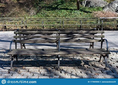 empty-wood-bench-at-riverside-park-on-the-upper-west-side-of-new-york-city-stock-photo-image
