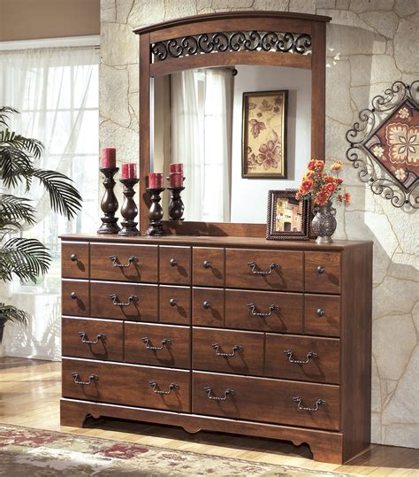 Ashley Signature Design Timberline 8 Drawer Dresser And Arched Mirror
