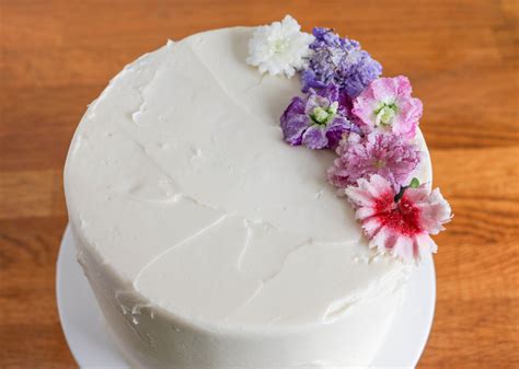 Cake decorating is one of the sugar arts that uses icing or frosting and other edible decorative elements to make plain cakes more visually interesting. How to Use Fresh Flowers in Cake Decorating