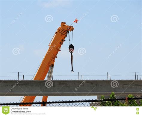 Crane By Overpass In Construction Site Florida Usa Stock Photo