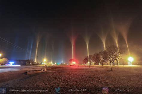 In Pictures Extraordinary Light Pillars Cast Colorful Columns In The
