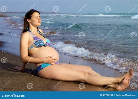 Beautiful Pregnant Woman On The Beach Relaxing Stock Image Image Of