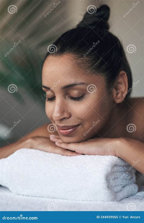 Rest Well And Your Energy Will Be Restored Shot Of A Young Woman Lying On A Massage Bed At A