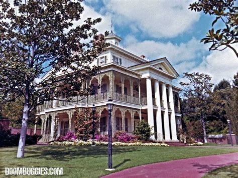 The freshly-opened Haunted Mansion in Disneyland, CA. (1969) | Vintage ...