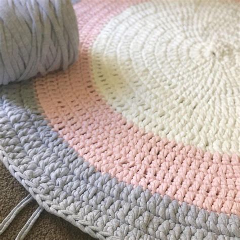 Check out esalerugs for tons of styles and sizes. Pale pink, light grey + white Tshirt yarn round nursery ...