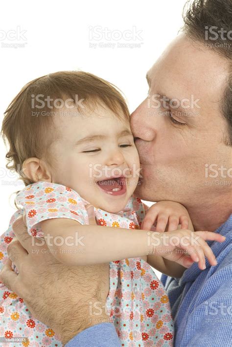 Father Kissing Baby Daughter Stock Photo Download Image Now 12 17