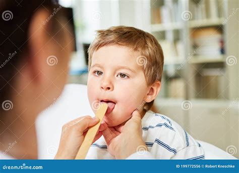 Doctor Examines Child With Tonsillitis Stock Photo Image Of Help