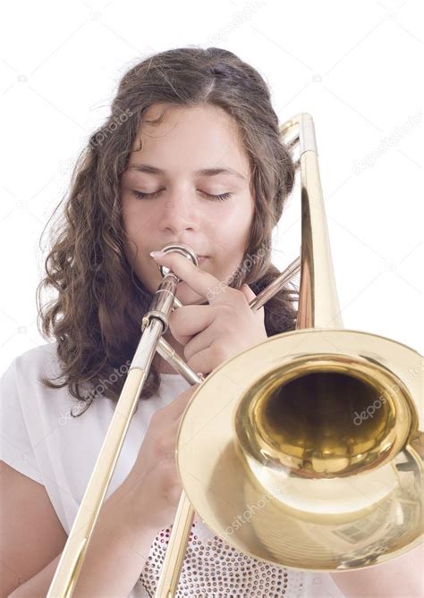Teenage Girl Playing The Trombone Stock Photo By ©guruxox 82953020