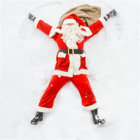 Happy Santa Claus Makes A Snow Angel Stock Photo Image Of Claus