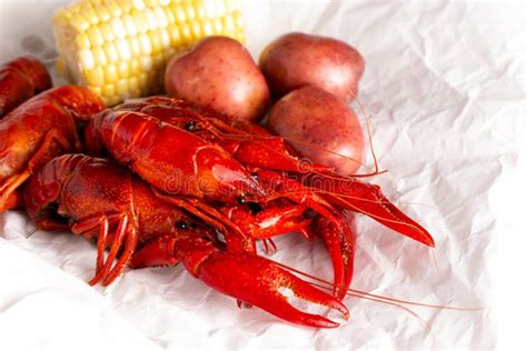 A Crawfish Boil With Corn On The Cob And Potatoes Stock Photo Image