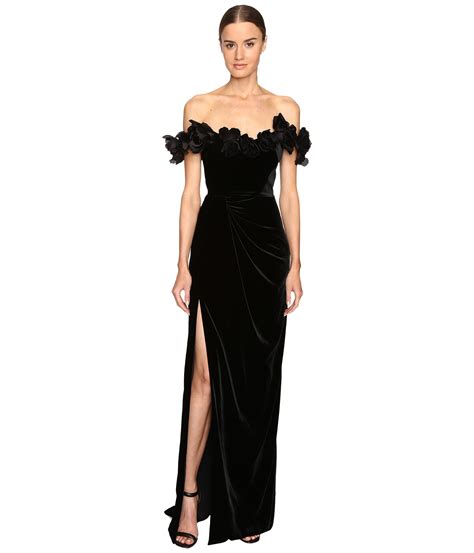 marchesa velvet off the shoulder column gown with high slit embellished with laser cut organza