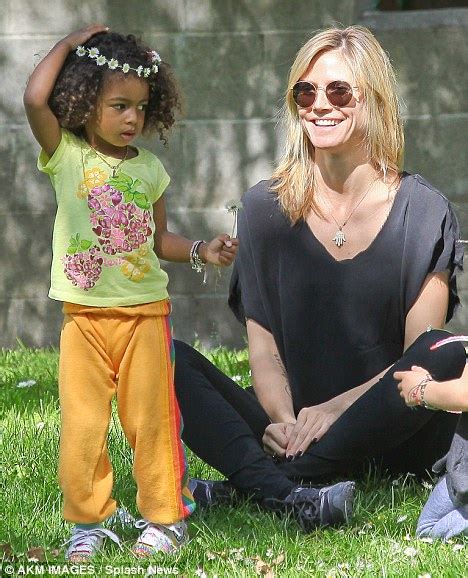 Heidi klum hit the streets of nyc on sunday, june 12 with her and seal's four kids: Heidi Klum spends the day making daisy chains with her ...