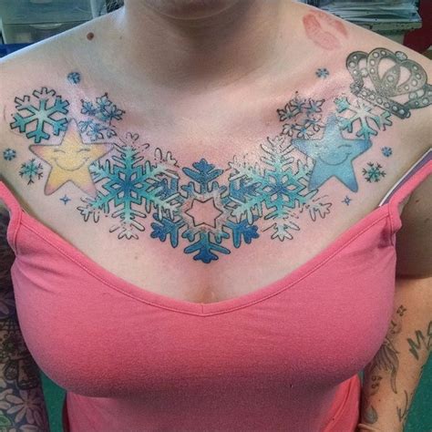 Back in the day tattoos inked all over the body could signify a social status, an initiatory rite, a marriage or celebration of the victory in war. snow-flake-stars-crown-chest-piece-girls-with-tattoos | Chest piece tattoos, Girl tattoos, Chest ...