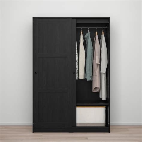 See this built in mirror closet. RAKKESTAD Wardrobe with sliding doors - black-brown - IKEA