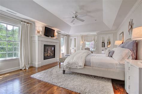 Master Bedroom With Fireplace Built In Vanity Mirrored Closet Doors