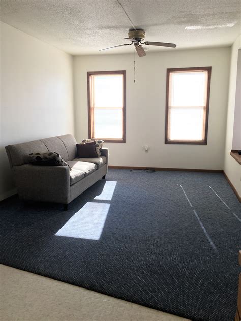 One half bath downstairs with the living room and unfurnished room. 114 Wright St. #1 - 1 Bedroom AUGUST 2021 - J & J Real Estate