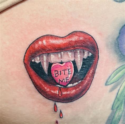 Realistic Vampire Bite Tattoo